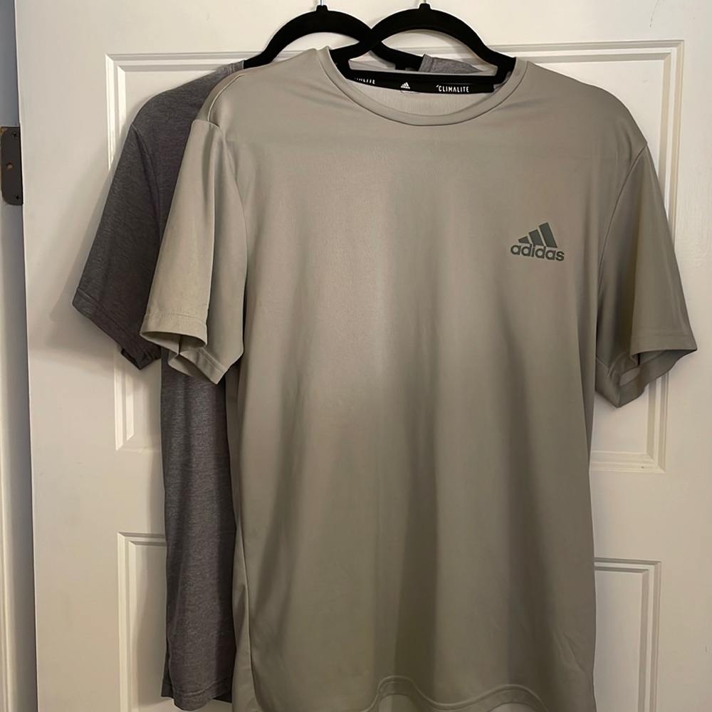 One adidas workout shirt and one cool keep